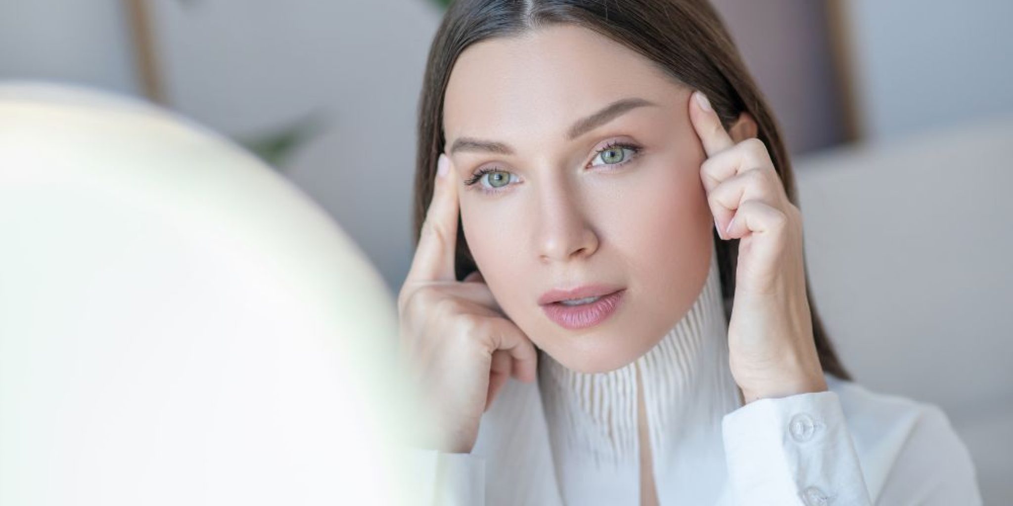 women checking her wrinkles with anti wrinkle peptide